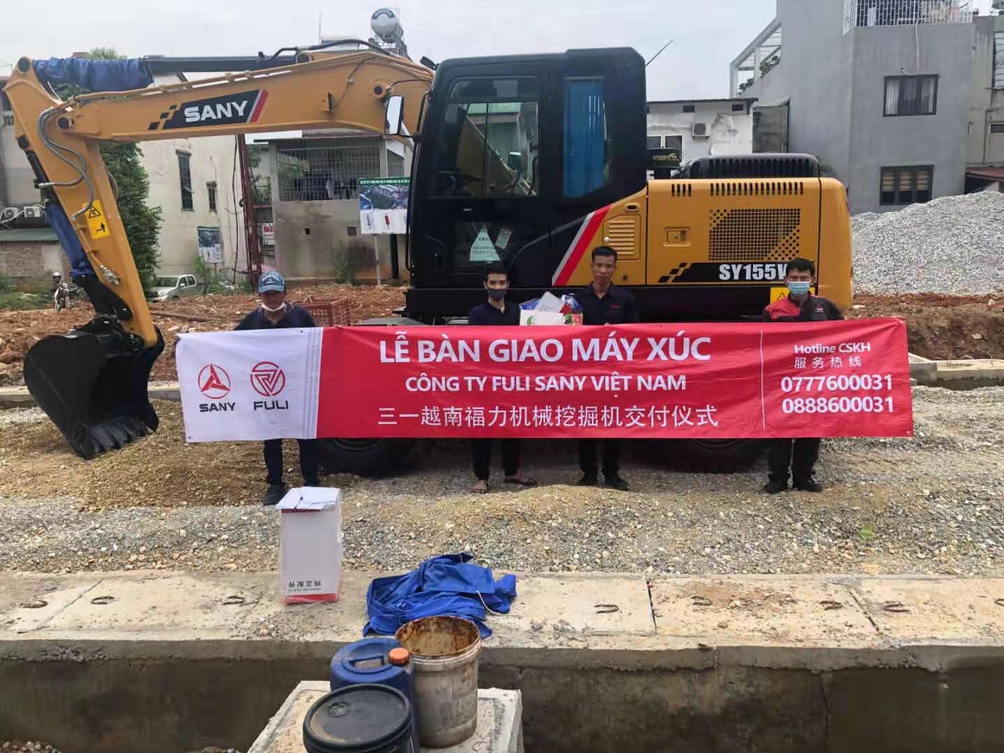 bàn giao máy xúc sy155w