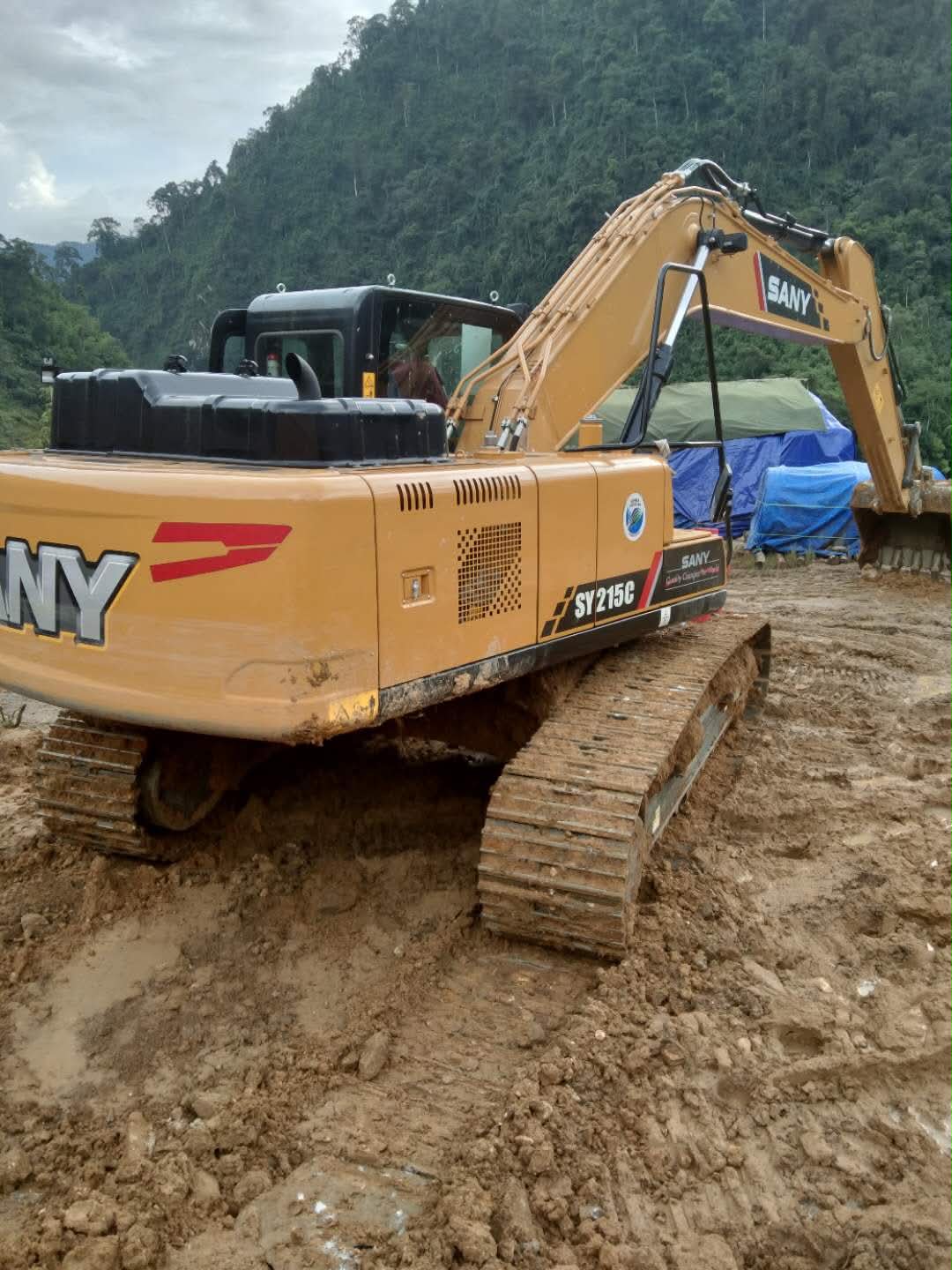 bàn giao máy xúc sy215c